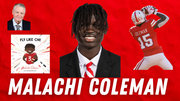 Malachi Coleman with Adam Carriker